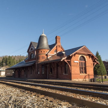 Perspective view, west track and front facade