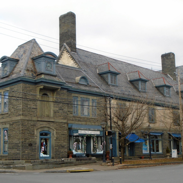 Bluestone building at left