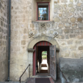Church side door to enwalled cemetery grounds