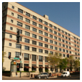 East elevation, looking northwest from corner of Chicago and Larrabee