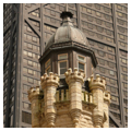 Detail, roof cap of water tower; Hancock Building at rear
