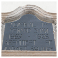 Architect dedication plaque, south side of square