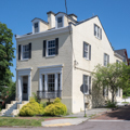 Greek Revival house (1845; 201 Washington) built for M. E. Hazlehurst.