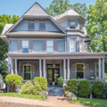 Noteworthy Queen Anne houses include one designed by George Sansbury (1890; 615 Washington).