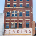 The former YMCA building (1893–1910; 145 Baltimore) was converted into the Peskin’s shoe and clothing store in 1940