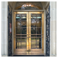 East entry, detail of original bronze doors