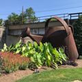 Watering can sculpture near former Western State Hospital