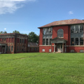 Charlotte Agricultural High School (on right) and school addition (on left)