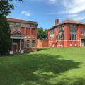 School addition (on left) and Charlotte Agricultural High School (on right)
