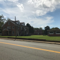 Dormitory (left foreground) and Moses Nursing Home (center background)